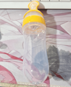 Baby Spoon Bottle Feeder (Color: yellow)